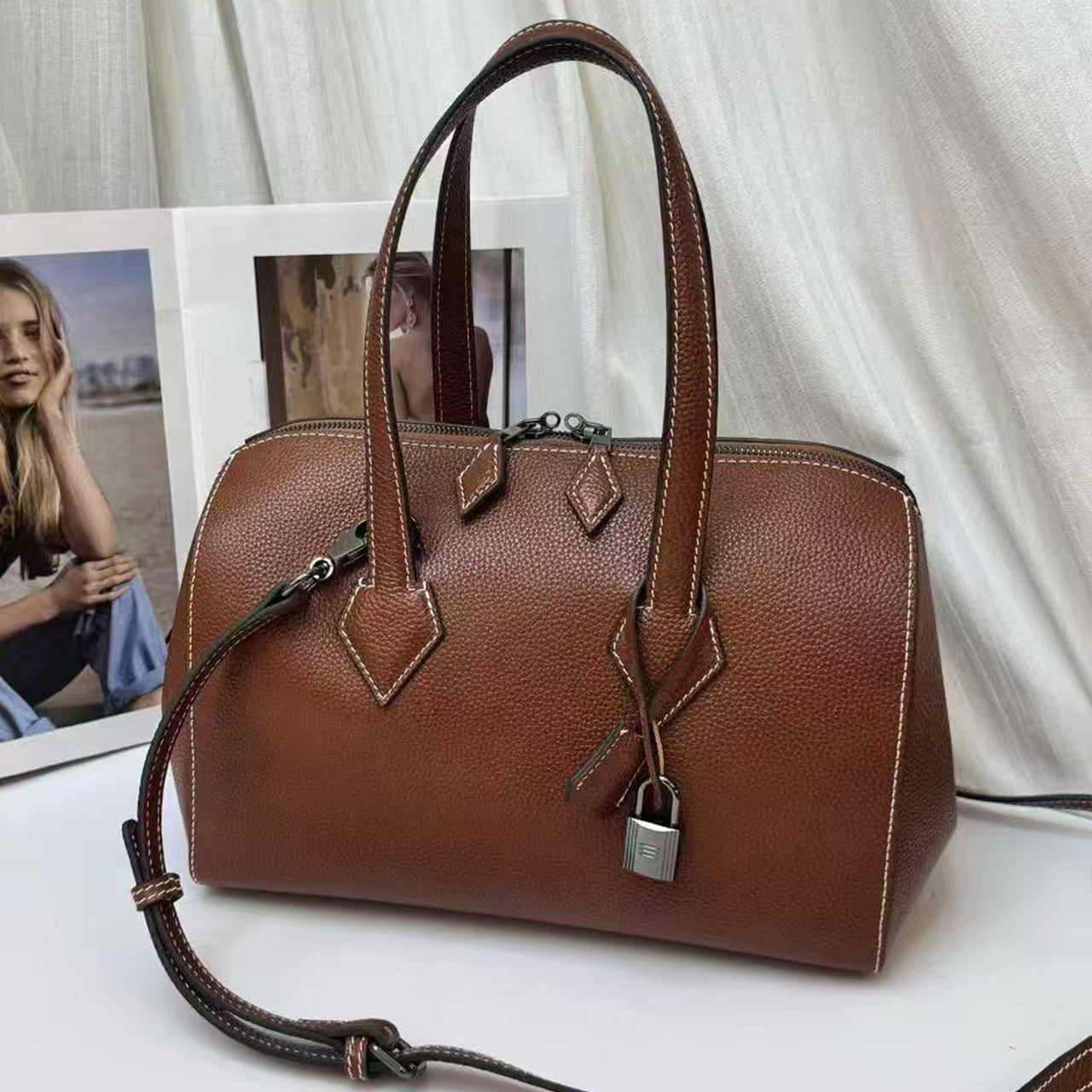 [PD1086] Handcrafted Barenia Faubourg full grain leather Boston bag, 28cm in length, featuring a smooth, durable retro inspired design with a luxurious shine. Crossbody strap included. Model PD1086